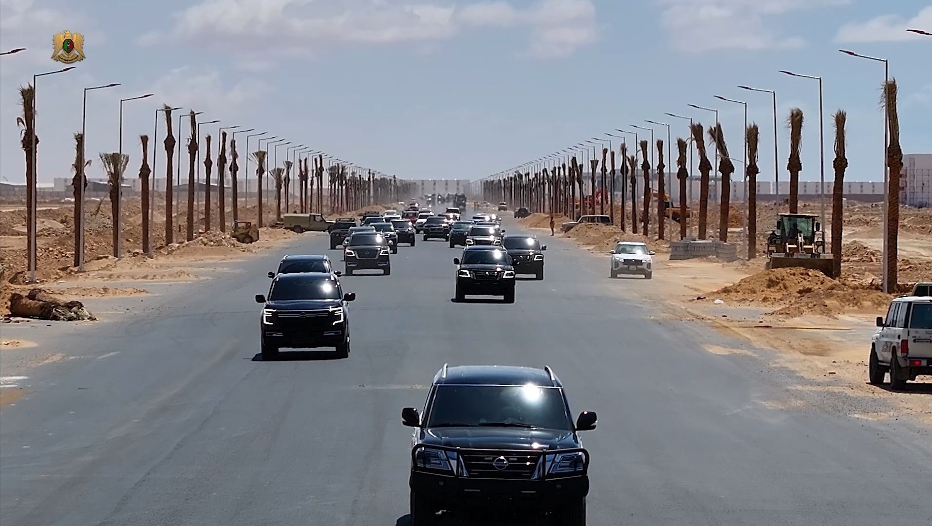 May be an image of car and road