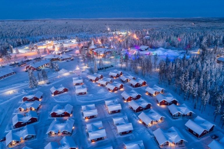 Aerial night view of Santa Claus Village in Rovaniemi in Lapland in Finland.