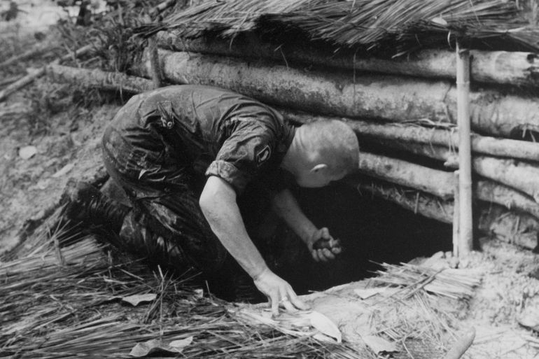 Vietnam War Civilians Evacuate Villagers evacuate An Hoa as a battle raged between the Viet Cong and U.S. Marines who had made an amphibious landing on the island, July 9, 1965. The Marines defeated the Communist forces that had previously engaged South Vietnamese troops there. (AP Photo)