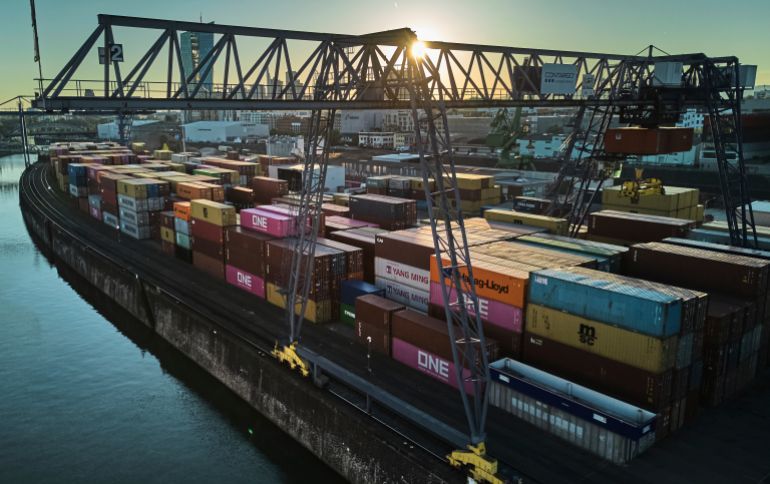 Containers are piled up in a cargo terminal in Frankfurt, Germany, Monday, April 28, 2025. (AP Photo/Michael Probst)