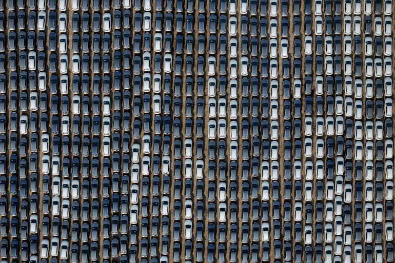 (FILES) This photo taken on April 18, 2024 shows BYD electric cars for export waiting to be loaded onto a ship at a port in Yantai, in eastern China's Shandong province. - Talks in Brussels over the European Union's tariffs on Chinese electric vehicles have ended with