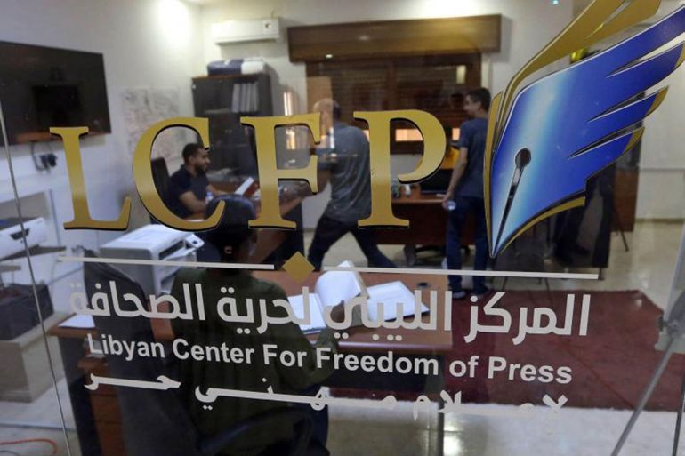 A picture taken on August 14, 2019, shows the window of the Libyan Center for Freedom of Press (LCFP) in Tripoli where application