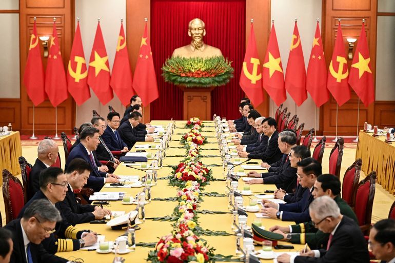 Vietnam's Communist Party General Secretary To Lam and China's President Xi Jinping attend a meeting at the office of the Party Central Committee in Hanoi on April 14, 2025. NHAC NGUYEN/Pool via REUTERS TPX IMAGES OF THE DAY