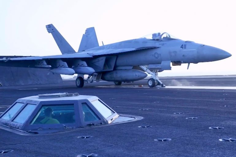 This image taken from video provided by the U.S. Navy shows an aircraft launching from the USS Harry S. Truman in the Red Sea before airstrikes in Sanaa, Yemen, Saturday, March 15, 2025. (U.S. Navy via AP)