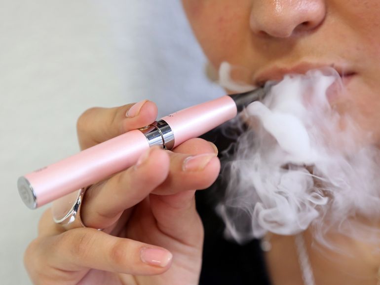 epa07673754 (FILE) - A person smokes an electronic cigarette in Nice, France, 05 March 2013 (reissued 26 June 2019). San Francisco became the first US city to ban electronic cigarettes (e-cigarettes) sales until their health effects are clearer. The city's board of supervisors on 25 June 2019 unanimously voted in favor of an ordinance saying that 'No person shall sell or distribute an electronic cigarette to a person in San Francisco.' The ban on sale and distribution will start in early 2020, and remain in place until US Food and Drug Administration (FDA) approval, media reported. EPA-EFE/SEBASTIEN NOGIER