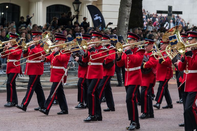 LONDON, UNITED KINGDOM - MAY 05, 2025: Armed Forces personnel march along the Mall, retracing a historic route from Parliament Square to Buckingham Palace, during 80th anniversary of VE Day celebrations in London, United Kingdom on May 05, 2025. Victory in Europe Day is the day celebrating Germany's unconditional surrender of its armed forces on Tuesday, 8 May 1945 towards the end of World War II. (Photo credit should read Wiktor Szymanowicz/Future Publishing via Getty Images)