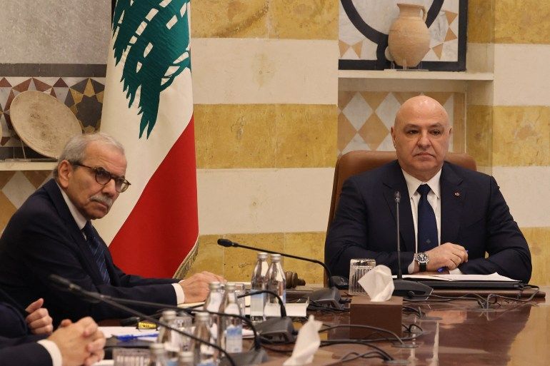 President Joseph Aoun (R) chairs the first meeting of Lebanon's new government, along with Premier Nawaf Salam, at the Baabda presidential palace, east of Beirut, on February 11, 2025. The new government was formed on February 8, ending more than two years under a caretaker cabinet. Salam said his newly-formed cabinet will strive to be a