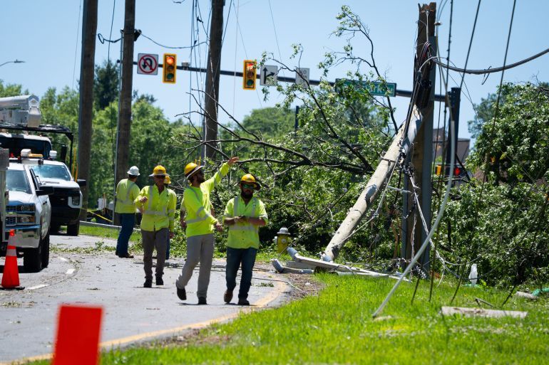 Alexandria, United States - May 17 : Some residents are without power and streets are closed in part of Alexandria, VA on Saturday, May 17, 2025 following a storm on Friday. Contracters work to replace broken electrical poles on Van Dorn Street between Holmes Run Pkwy and Landmark St. (Photo by Sarah L. Voisin/The Washington Post via Getty Images)