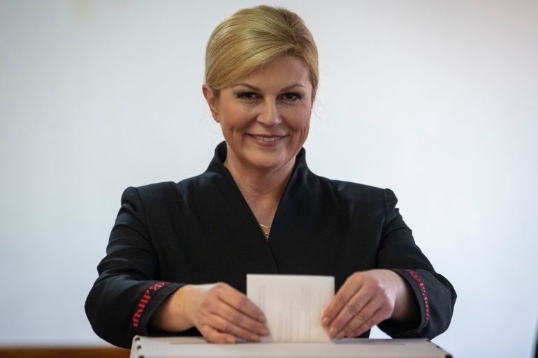 Incumbent president Kolinda Grabar Kitarovic casts her ballot at a polling station in Zagreb, Croatia, Sunday, Jan. 5, 2020. Voters in Croatia on Sunday cast ballots to choose a new president in a fiercely contested runoff race, with a liberal opposition candidate posing a challenge to the conservative incumbent as the country presides the European Union during a crucial period. (AP Photo/Darko Bandic)
