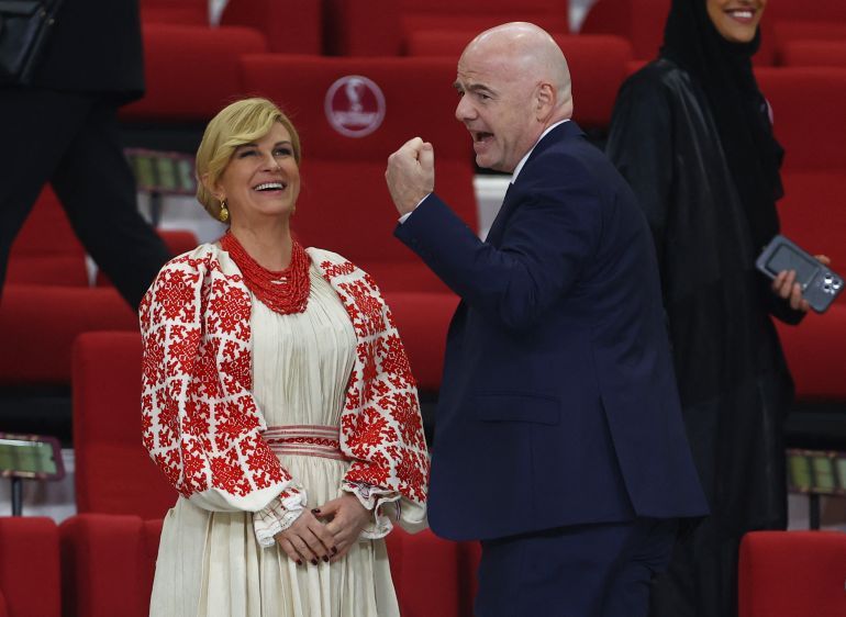 Soccer Football - FIFA World Cup Qatar 2022 - Group F - Croatia v Canada - Khalifa International Stadium, Doha, Qatar - November 27, 2022 Former president of Croatia Kolinda Grabar-Kitarovic and FIFA president Gianni Infantino are seen in the stand before the match REUTERS/Hannah Mckay