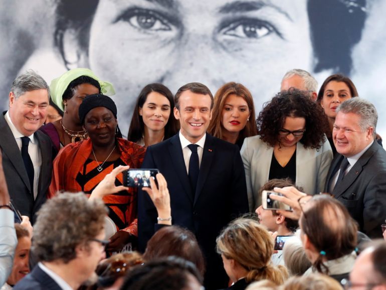 Pierre-Francois Veil, Cameroonian activist Aissa Doumara Ngatansou, France President's Emmanuel Macron, Delphine Horvilleur and Jean Veil pose for a picture during the presentation of the Simone Veil prize, at the Elysee Palace, in Paris, France March 8, 2019. Thibault Camus/Pool via REUTERS