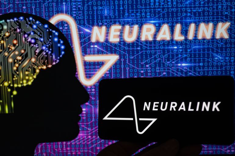 Neuralink displayed on mobile with chip brain seen on screen. On 18 April 2023 in Brussels, Belgium.