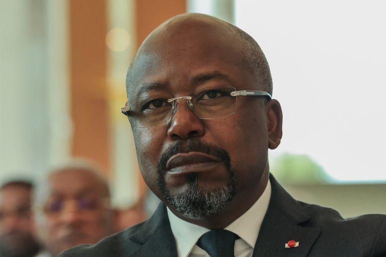 Gabon's former prime minister, Alain Claude Bilie-By-Nze looks on before General Brice Oligui Nguema (unseen) is sworn in as Gabon's transitional president in Libreville on September 4, 2023. (Photo by AFP)