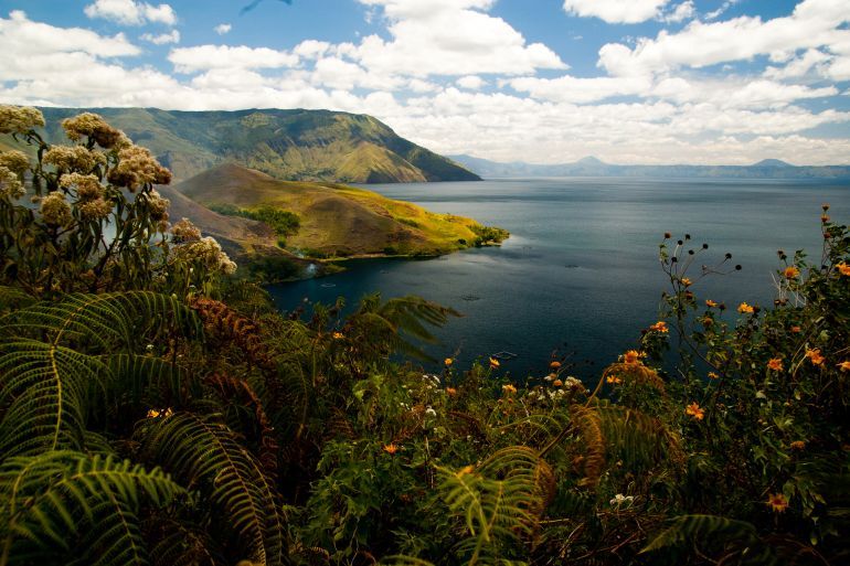 View of stunning Lake Toba and coast of Samosir Island in Sumatra, Indonesia.