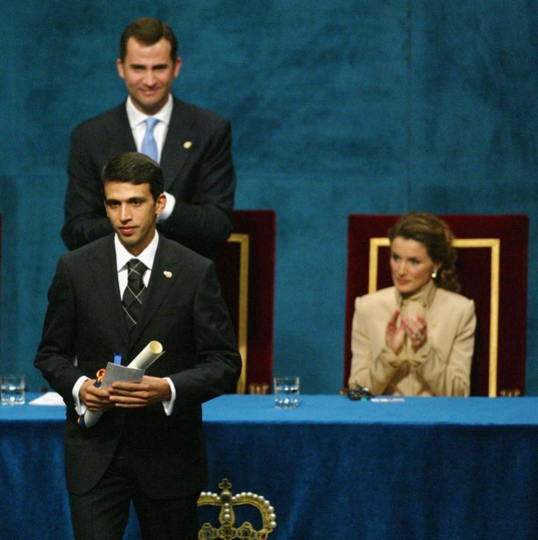 OVIEDO, SPAIN - OCTOBER 22: Hicham El Guerrouj receives an award from Crown Prince Felipe and Princess Letizia of Spain during the