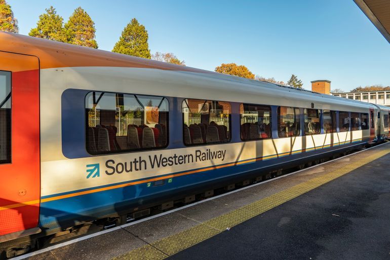Fleet, Hampshire, UK. 18th November 2018. South Western railway Class 444 express train about to depart for Basingstoke and the South coast; Shutterstock ID 1239704575; purchase_order: aj; job: ; client: ; other: