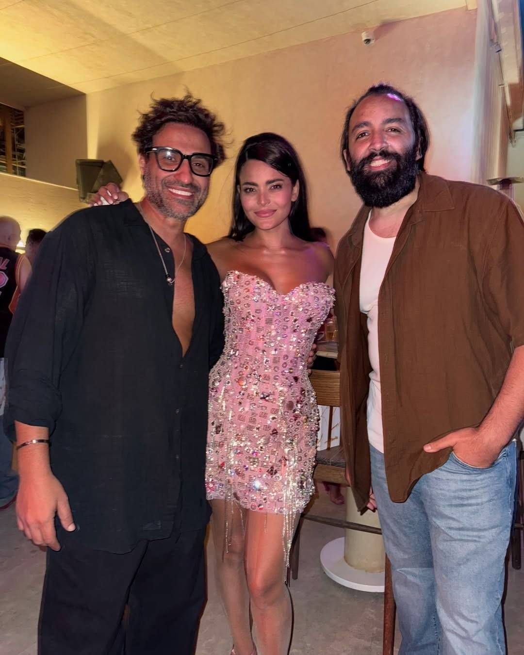 May be an image of 3 people and beard