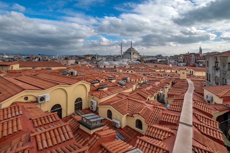 View of the roof of the Grand Bazaar (Covered Bazaar,Kapalicarsi) and the Nuruosmaniye Mosque in Beyazit,Fatih District of Istanbul.