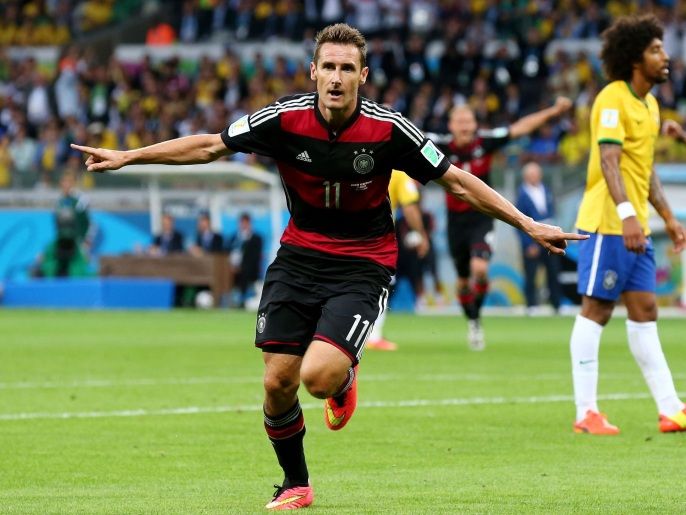 BELO HORIZONTE, BRAZIL - JULY 08: Miroslav Klose of Germany celebrates scoring his team's second goal during the 2014 FIFA World Cup Brazil Semi Final match between Brazil and Germany at Estadio Mineirao on July 8, 2014 in Belo Horizonte, Brazil.