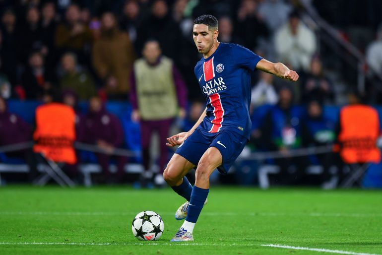 PARIS, FRANCE - NOVEMBER 06: Achraf Hakimi of PSG kicks the ball during the UEFA Champions League 2024/25 League Phase MD7 match between Paris Saint-Germain and Atletico de Madrid at Parc des Princes on November 06, 2024 in Paris, France. (Photo by Franco Arland/Getty Images)