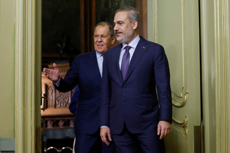 Russian Foreign Minister Sergei Lavrov and Turkish Foreign Minister Hakan Fidan arrive to hold a press conference in Moscow, Russia, August 31, 2023. REUTERS/Maxim Shemetov/Pool