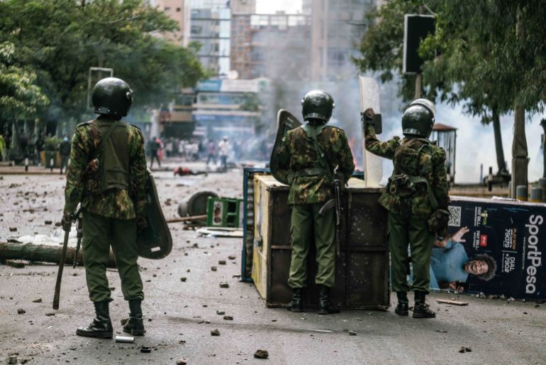 Mandatory Credit: Photo by Sadat swaka/UPI/Shutterstock (14559801a)Kenya Police officers during they clash with protesters during a nationwide strike to protest against tax hikes and the Finance Bill 2024 in downtown Nairobi, on June 25, 2024. Kenyan police fired tear gas at crowds of young protesters in the capital Nairobi on Tuesday, as demonstrators rallied across the country against the government's proposed tax increases. Protests in Kenyan Against The Government's Proposed Tax Increases, Nairobi - 25 Jun 2024