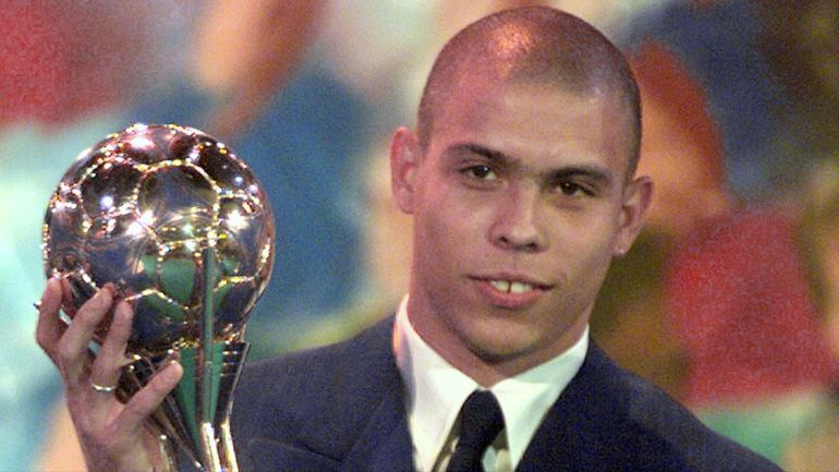 Brazilian soccer star Ronaldo Luiz Nazario de Lima poses with his trophy after he won the prestigious FIFA World Player of the Year at an awards ceremony in Disneyland Paris in Marne La Vallee, eastern Paris, January 12. Ronaldo, who currently plays with Inter Milan, won the title for the second year in a row while fellow countryman Roberto Carlos who plays at Spain's Real Madrid finished in second place.SPORT SOCCER
