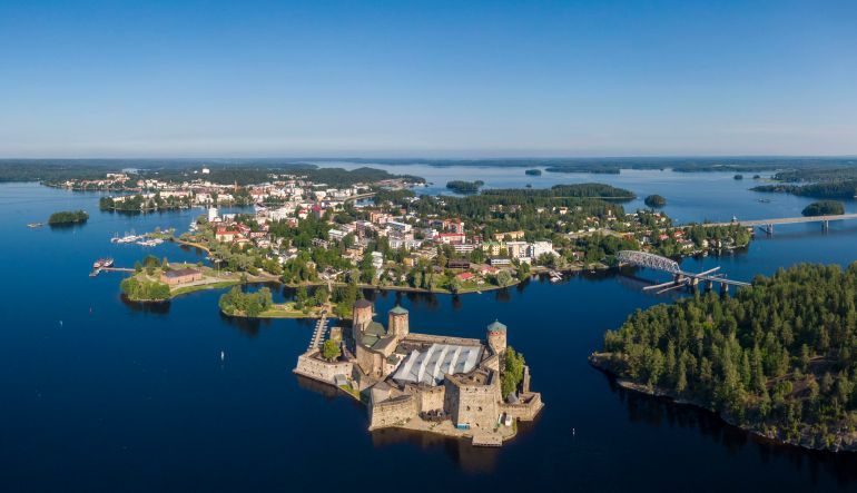 Aerial view of Olavinlinna castle and Savonlinna town in the heart of the Saimaa lake region in Finland