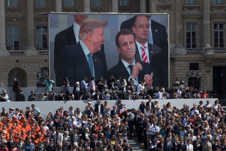 Donald Trump and Emmanuel Macron on Bastille Day in Paris in 2017. Carolyn Kaster/Associated Press