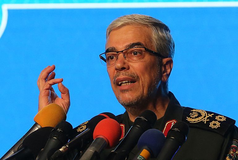 TOPSHOT - (FILES) Iranian Armed Forces Chief of Staff Major General Mohammad Bagheri speaks during the the International Conference on the Legal-International Claims of the Holy Defense in the capital Tehran on February 23, 2021.