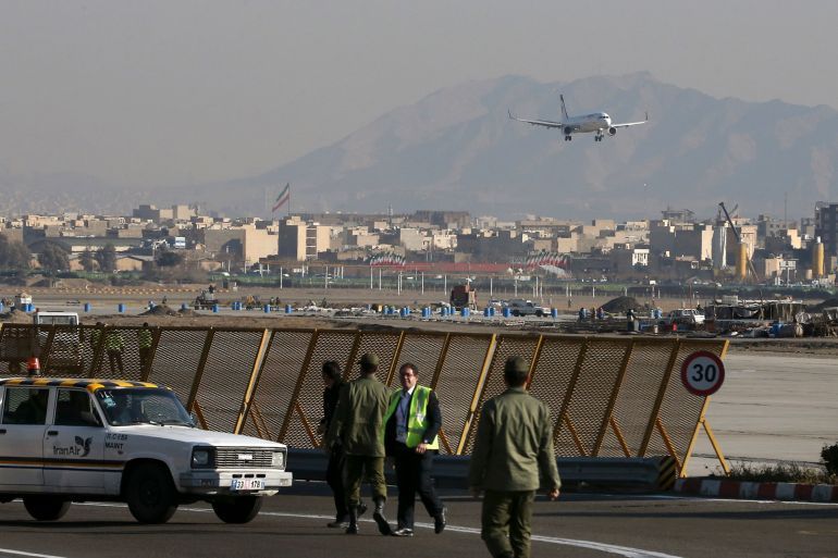 CORRECTS NAME OF AIRPORT - Iran Air's new Airbus plane approaches Mehrabad airport, in Tehran, Thursday, Jan. 12, 2017. The first of 100 Airbus planes that Iran is expected to receive after its historic nuclear deal with world powers ended some sanctions landed on Thursday in the capital, Tehran. (AP Photo/Vahid Salemi)