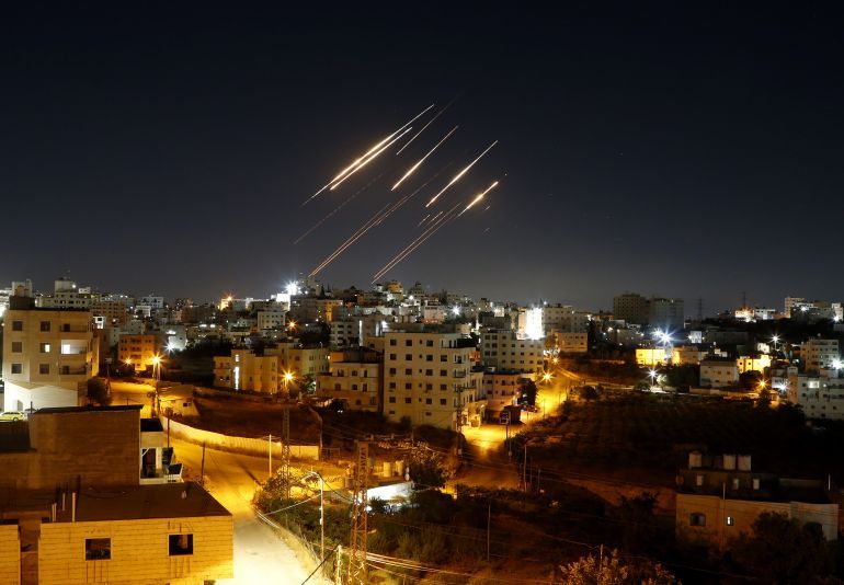 HEBRON, WEST BANK JUNE 15: Streaks of light from Iranian ballistic missiles are seen in the night sky above Hebron, West Bank, as Iran resumes its retaliatory strikes against Israel. The renewed wave of attacks follows heightened regional tensions and comes in response to previous Israeli operations targeting Iranian territory. (Photo by Wisam Hashlamoun/Anadolu via Getty Images)