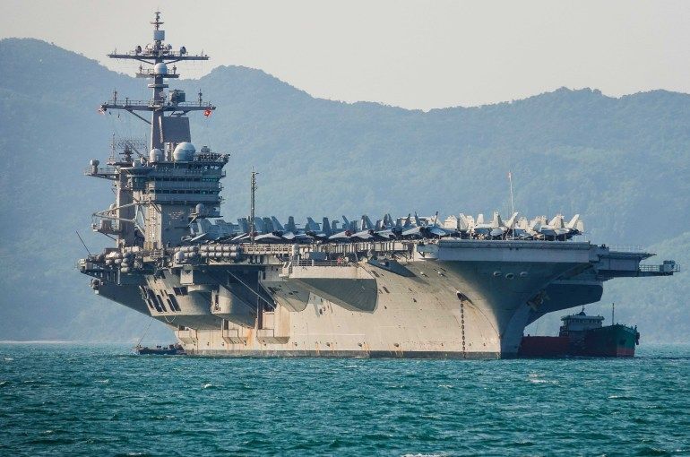 DANANG, VIETNAM - MARCH 5: The United States aircraft carrier, USS Carl Vinson, anchored off the coast at Tien Sa Port on March 5, 2018 in Danang, Vietnam. A United States aircraft carrier, USS Carl Vinson, made a historic visit to Vietnam on Monday in the central city of Danang, marking the biggest U.S. military presence in Vietnam since the end of the Vietnam War in 1975. The nuclear-powered Nimitz-class vessel will remain anchored at Tien Sa Port for several days as it illustrates Vietnam's evolving relationship with Beijing over the disputed South China Sea. (Photo by Getty Images/Getty Images)