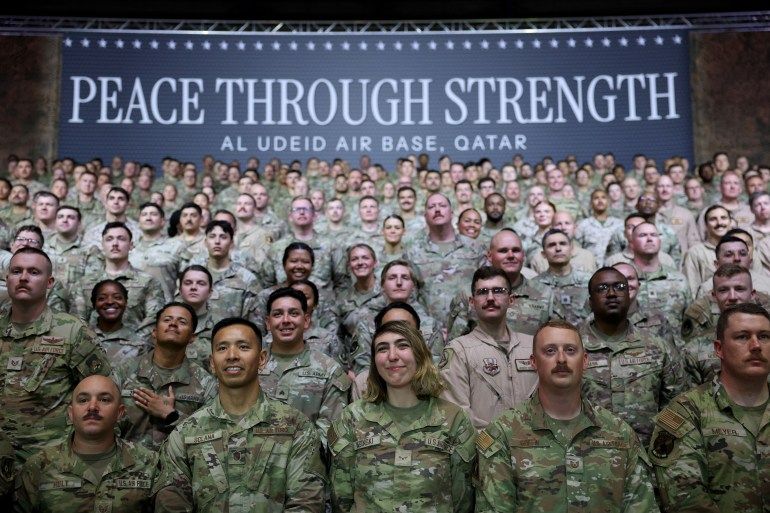 DOHA, QATAR - MAY 15: Military personnel attend as U.S. President Donald J. Trump (not pictured) tours the Al Udeid Air Base on May 15, 2025, in Doha, Qatar. Trump is on the third day of his visit to the Gulf to underscore the strategic partnership between the United States and Qatar, focusing on regional security and economic collaboration. (Photo by Win McNamee/Getty Images)