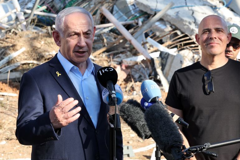 Israel's Prime Minister Benjamin Netanyahu gives a statement during a visit to the site of the Weizmann Institute of Science, which was hit by an Iranian missile barrage, in the central city of Rehovot on June 20, 2025.