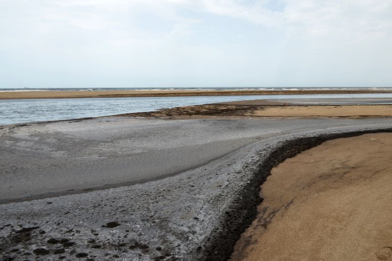 Residues from chemical plants in the Ghannouch industrial zone in Gabes in southeastern Tunisia, flow toward the Mediterranean sea, on May 22, 2025.