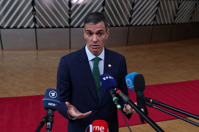 Spanish Prime Minister Pedro Sanchez speaks to the media as he arrives to attend the European Union leaders summit in Brussels, Belgium June 26, 2025. REUTERS/Yves Herman