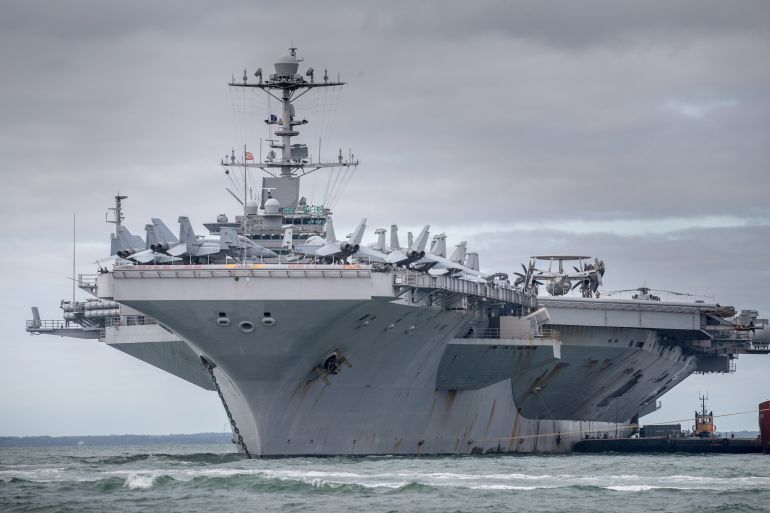 PORTSMOUTH, ENGLAND - OCTOBER 08: The US warship USS Harry S. Truman is pictured anchored in The Solent on October 8, 2018 near Portsmouth, England. The nuclear powered aircraft carrier, named after the 33rd President of the United States with a crew of more than 5,000, has been at sea since late August and has been on operations in the North Atlantic, Mediterranean and Arabian Gulf. The Nimitz-class ship, launched in 1998 and carries more than 70 helicopters and fixed-wing aircraft, arrived in The Solent on Saturday for a five-day stay. (Photo by Matt Cardy/Getty Images)