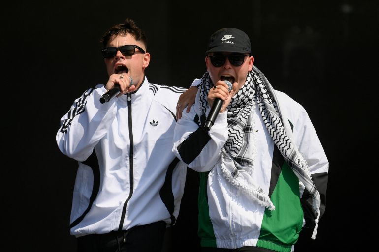 Moglai Bap and Mo Chara of Kneecap perform at Glastonbury Festival at Worthy Farm in Pilton, Somerset, Britain, June 28, 2025. REUTERS/Jaimi Joy