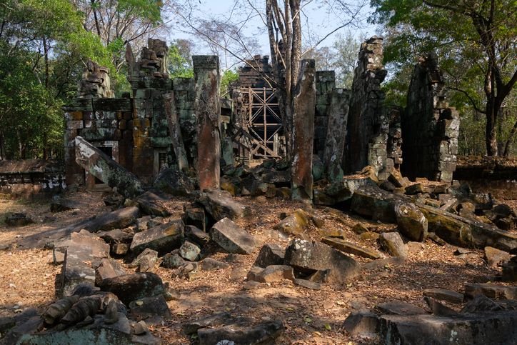 Koh Ker, Preah Vihear Province, Cambodia, February 6, 2018: Ruined gopuram (gateway) at Banteay Pee Chean at the UNESCO-listed Koh Ker archaeological site in northern Cambodia. The central laterite tower, the largest structure of Banteay Pee Chean, is surrounded by eight brick towers. Due to lack of conservation, they lie unexcavated and in a ruined state. Banteay Pee Chean is the only Khmer temple at Koh Ker dedicated exclusively to Brahma.