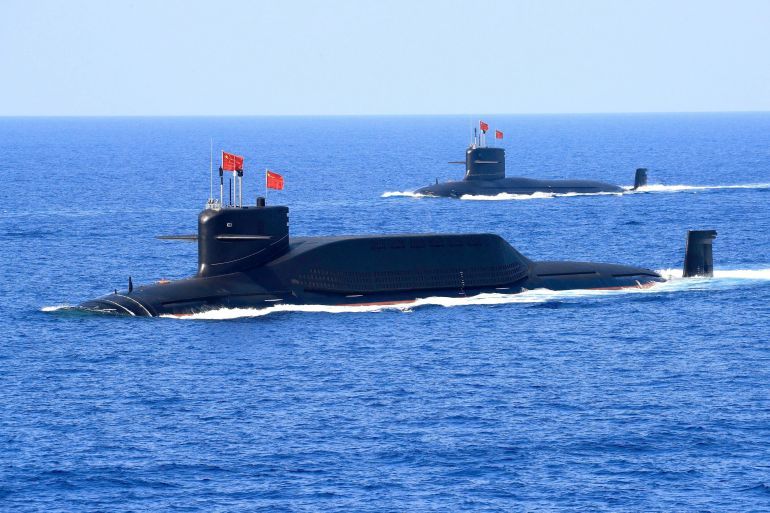 FILE PHOTO: Nuclear-powered Type 094A Jin-class ballistic missile submarine of the Chinese People's Liberation Army (PLA) Navy is seen during a military display in the South China Sea