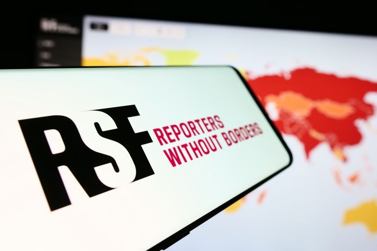 Stuttgart, Germany - 05-23-2024: Mobile phone with logo of international organisation Reporters Without Borders in front of website. Focus on center-left of phone display. Unmodified photo.; Shutterstock ID 2469220361; purchase_order: aj; job: ; client: ; other: