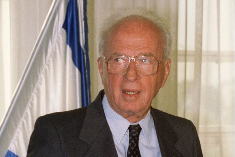 Israeli Prime Minister Yitzhak Rabin holds a glass of brandy March 1 as he celebrates today his 73rd birthday. Rabin answered reporters, who asked if he would run in the next general election in 1996, that he is 73-years-old and healthy and the oldest member of the government but does not know what will happen next year