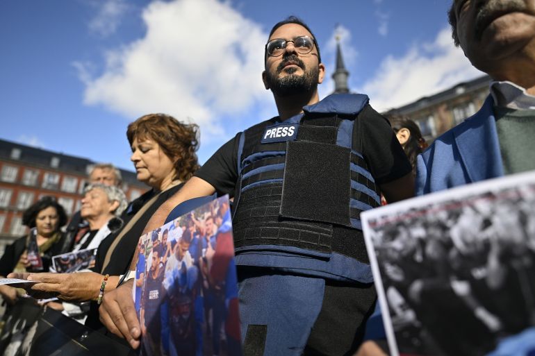 MADRID, SPAIN - SEPTEMBER 26: Reporters Without Borders (RSF) stage a demonstration at Plaza Mayor in Madrid, where they filed their fourth complaint with the International Criminal Court (ICC) against Israel, condemning the killing of over 130 journalists in Palestine in the past year. RSF members also stated that the largest massacre against the press in the shortest time took place in Palestine, during demonstrations held in 10 cities across Europe on September 26, 2024. (Photo by Burak Akbulut/Anadolu via Getty Images)