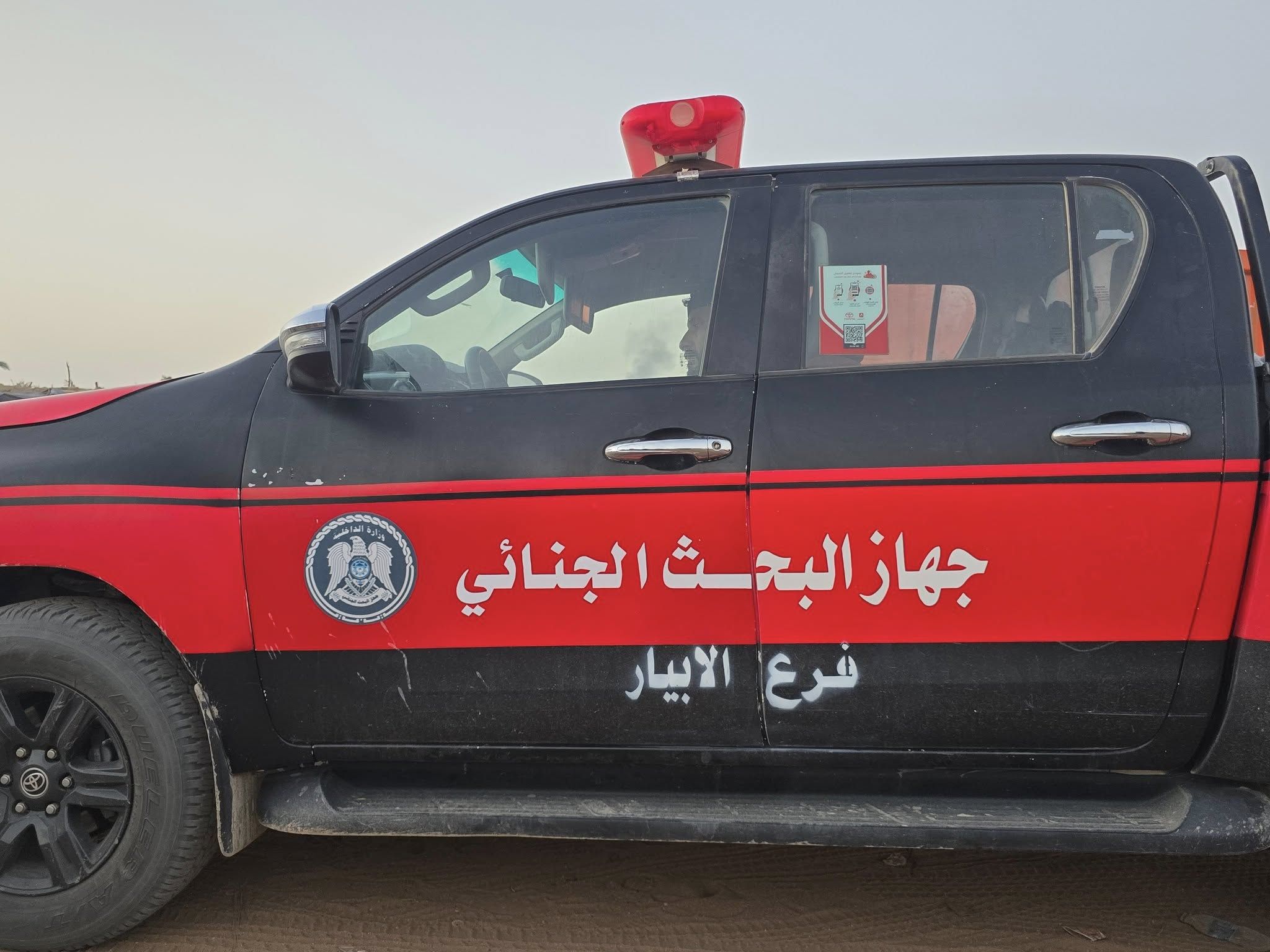 May be an image of ‎ambulance, car and ‎text that says '‎ا 0 O جهاز البحث الجنائي فرع الابيار‎'‎‎
