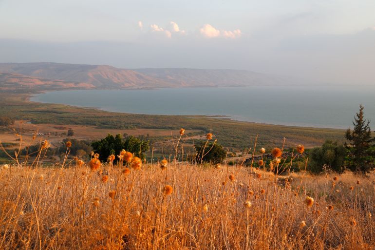 A picture taken on October 8, 2018, from the Chorazim Kibbutz, shows a general view of the northern shore of the Sea of Galilee. The Sea of Galilee, where Christians believe Jesus walked on water, has been shrinking for years, mainly due to overuse, and environmentalists are raising the alarm. (Photo by JACK GUEZ / AFP)