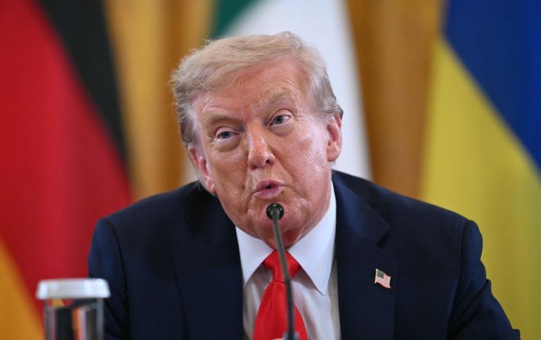 US President Donald Trump speaks during a meeting with Ukrainian President Volodymyr Zelensky and European leaders in the East Room of the White House in Washington, DC, on August 18, 2025.