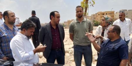 جهاز 15 مايو يسترد أرض بمساحة 5000 متر بالتعاون مع الشرطة.. بالصور - الكويت الاخباري