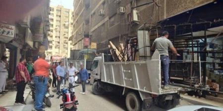 رفع ٣٠٠ حالة إشغال وتعديات من المحال والمنشآت التجارية بالجيزة - الكويت الاخباري