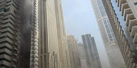 إخماد حريق ضخم في برج سكني مكوَّن من 67 طابقًا في دبي.. صور - الكويت الاخباري